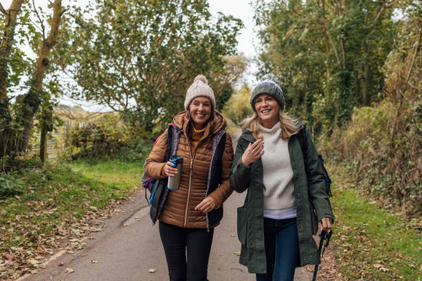 Two Friends Walking Through the Countryside
