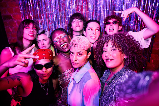 Diverse Group of LGBTQIA Friends Celebrating at a Party