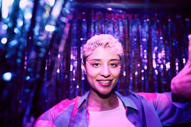 LGBTQIA female at a party.