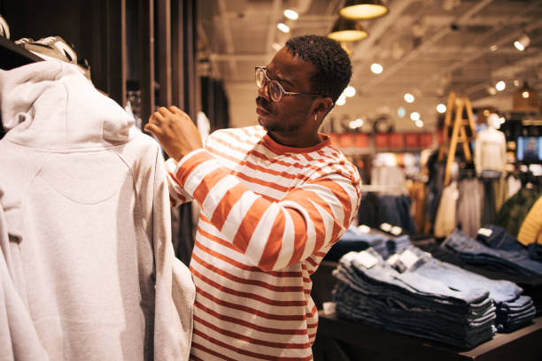 istock Young black man at shopping 1837333626
