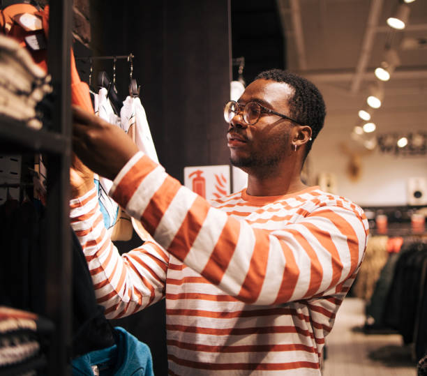 istock Young black man at shopping 1837337000