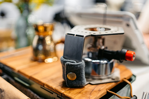 Mini gas stove on the table in a coffee shop in Kuwait City in Kuwait.