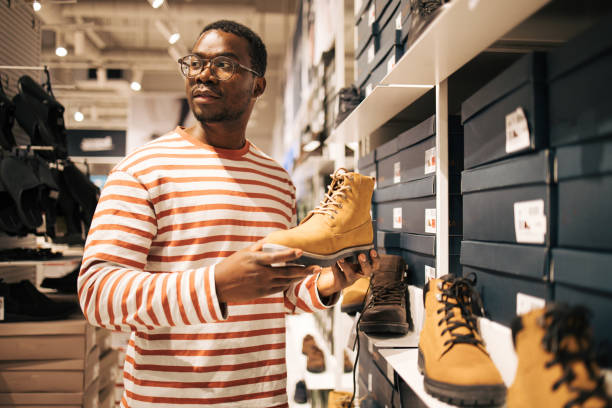 istock Young black man at shopping 1837347279