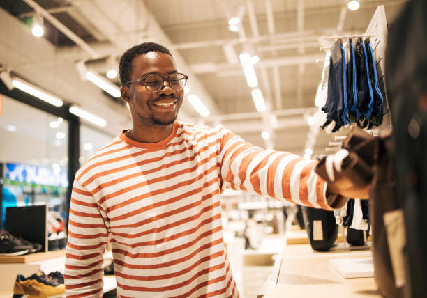 istock Young black man at shopping 1837353532