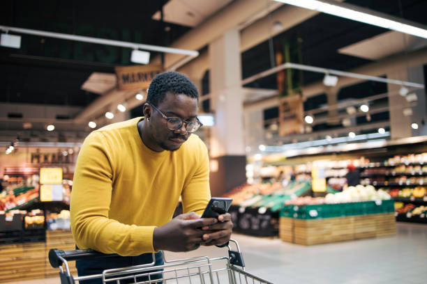istock Man shopping for groceries 1837360337
