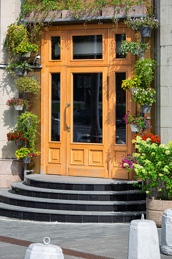 A group of five traditional apartment entrance doors in Gamla Stan, the historic old town of Stockholm, Sweden.