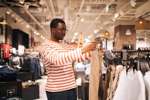 istock Young black man at shopping 1837376491