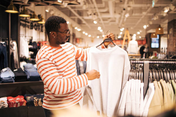 istock Young black man at shopping 1837376493