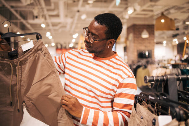 istock Young black man at shopping 1837377014