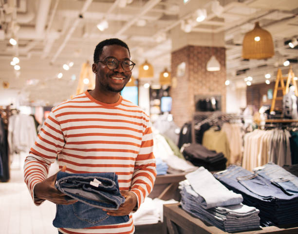 istock Young black man at shopping 1837381155