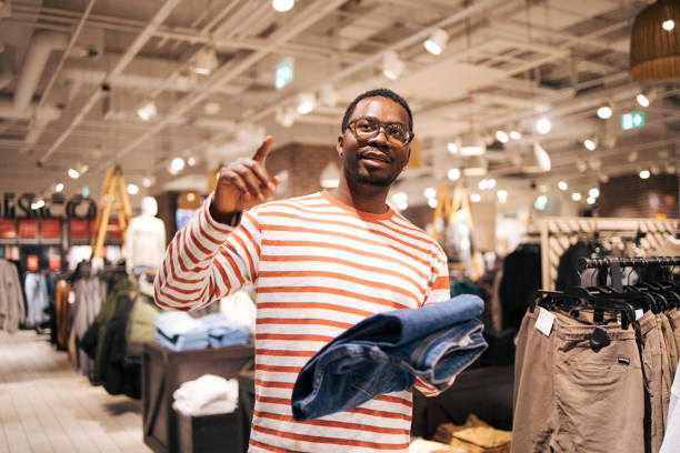 istock Young black man at shopping 1837386098