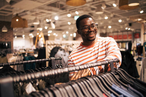 istock Young black man at shopping 1837387200