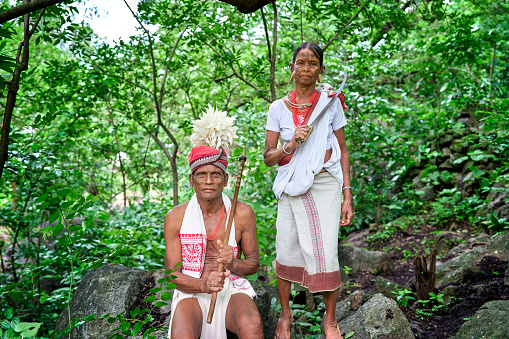 A woman and a man from the Lanjia Saura tribe of the Indian region of Odisha in the middle of the jungle