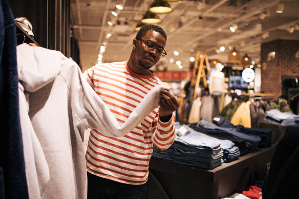 istock Young black man at shopping 1837389903