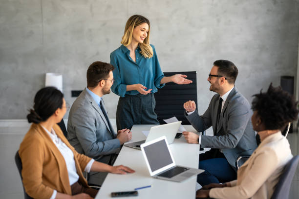 istock Successful multiethnic business people presenting analytical report while working together in office 1837448783