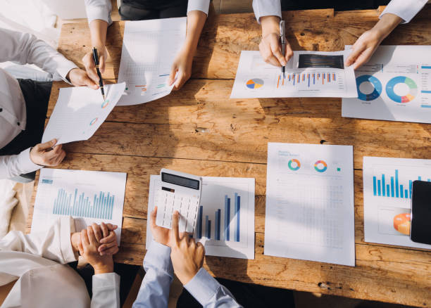 istock Brainstorming Collaboration and successful partnership analysis by Young business Asian people working in an office workspace 1837468418