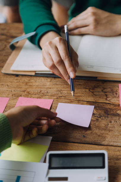 istock Brainstorming Collaboration and successful partnership analysis by Young business Asian people working in an office workspace 1837469496