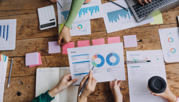 istock Brainstorming Collaboration and successful partnership analysis by Young business Asian people working in an office workspace 1837469497