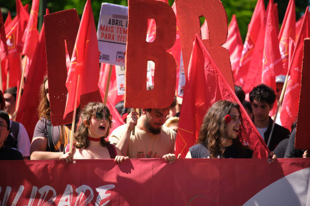 Lisbon, Portugal - April 25, 2023: Anniversary celebration of The Carnation Revolution aka the 25 April Revolution (25 de Abril) by demonstration march