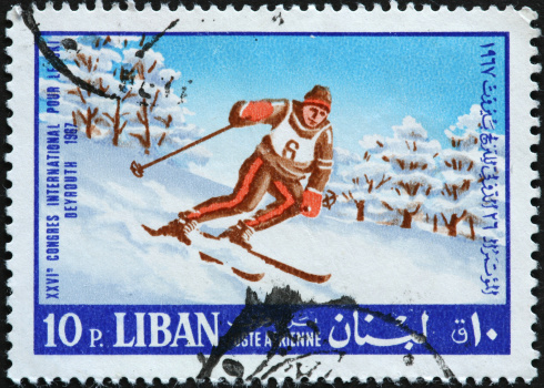 old fashioned skier on a Lebanese stamp