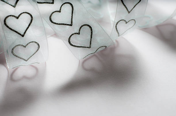 istock textile tulle ribbon with hearts 183750619