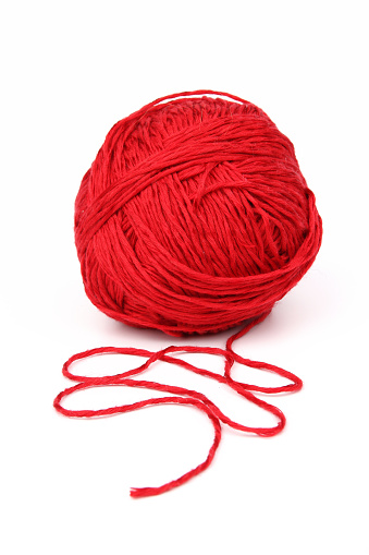 Red wool on white background.