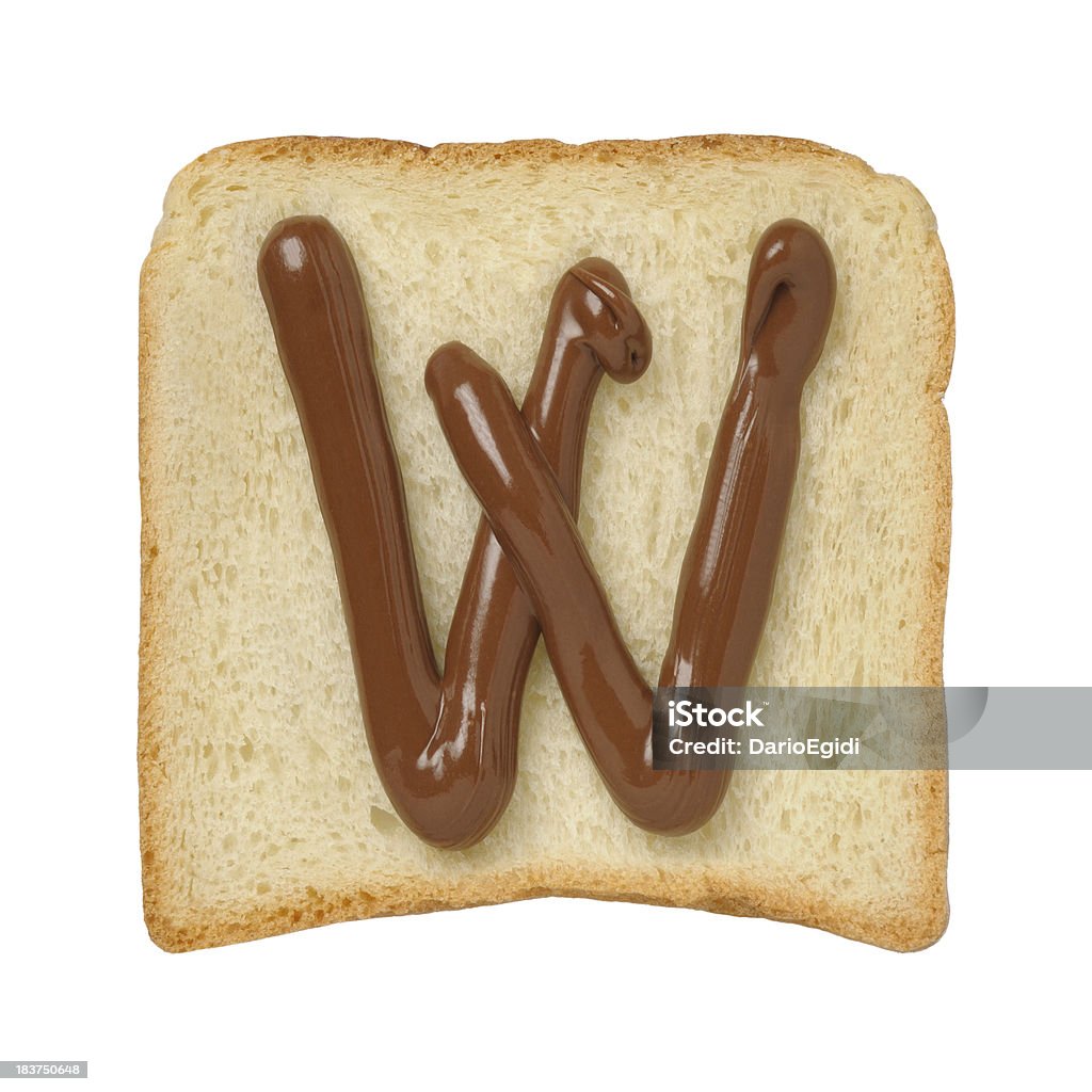 Chocolate letter W on a tinloaf slice, white background  Alphabet Stock Photo