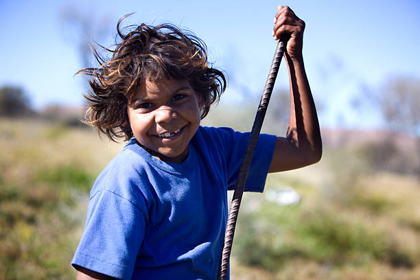 Aboriginal Child A a happy Indigenous girl living in out back Australia australian aborigine culture stock pictures, royalty-free photos & images