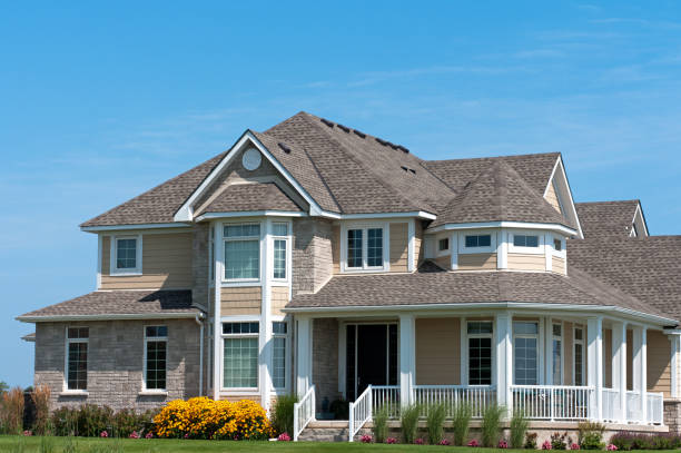 istock White Porch on Large New House 183750884