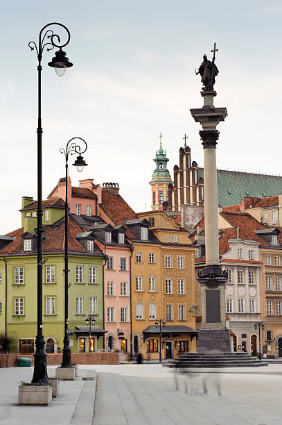 Old historic house roofs, church spires and Sigismund's Column called Kolumna Zygmunta by autumn day.