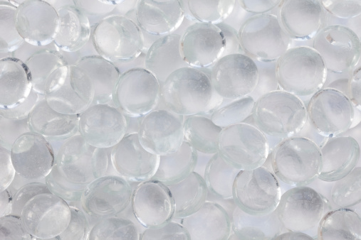 Full frame background of clear glass beads