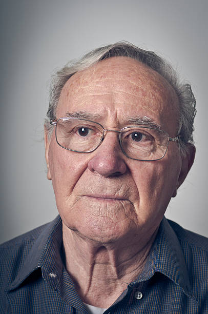 istock sad senior man wearing glasses 183751860