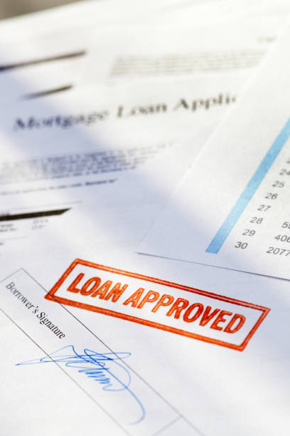 istock Mortgage Application Document with Red “Loan Approved” Approval Rubber Stamp 183752054