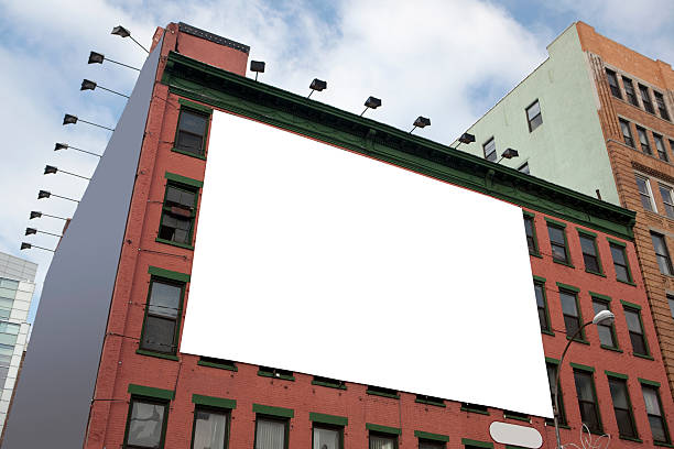 istock Blank white billboard on the side of a tall building 183752172