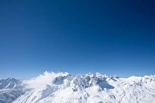 "Peaks of Alps mountains in St. Anton am Arlberg, Austria ski resort."