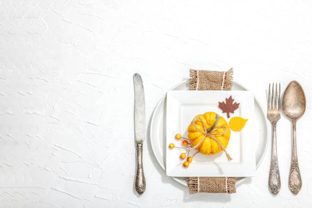 istock Autumn table setting. Thanksgiving cutlery, traditional fall decor. Cozy mood, minimalist design 1837524230