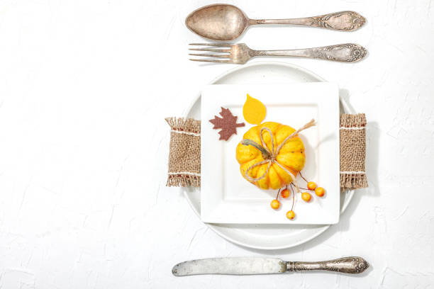 istock Autumn table setting. Thanksgiving cutlery, traditional fall decor. Cozy mood, minimalist design 1837524474