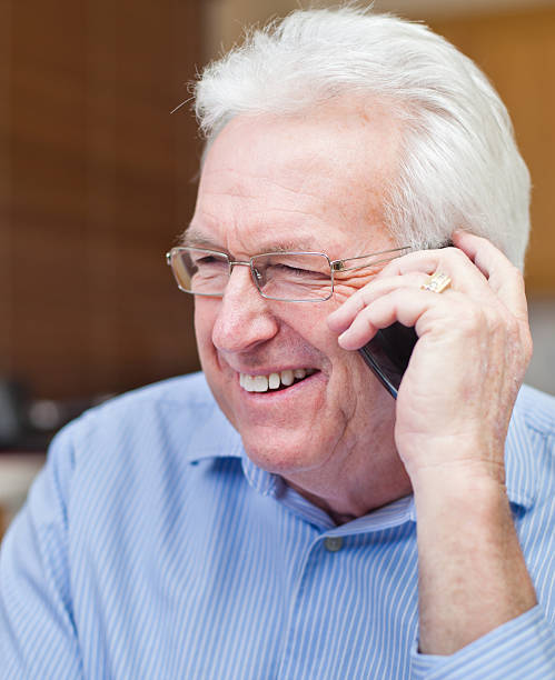 istock Senior Man On Cell Phone 183753950