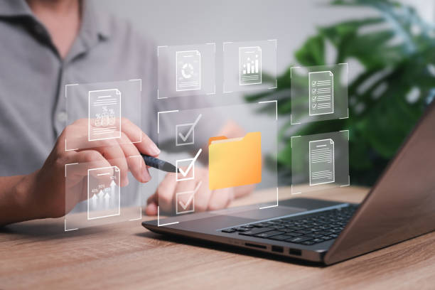 istock Enterprise Resource Planning, Document management, and business-grown data report concept. Businessman use laptops and select business data folders financial information business-grown graphs 1837546894