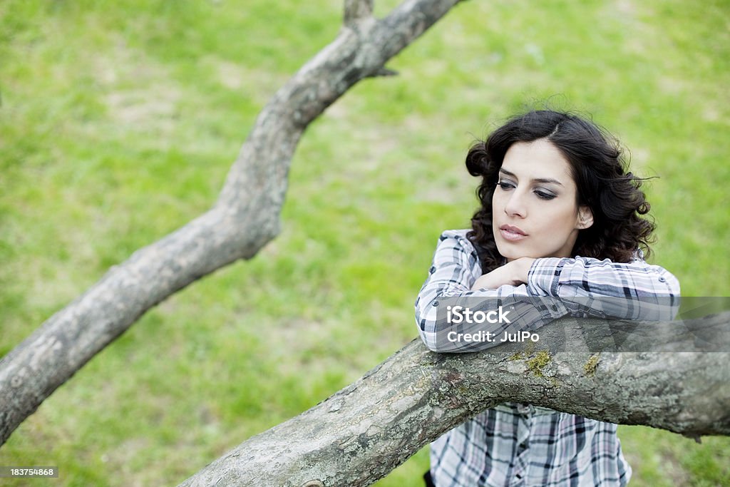 Spring Young girl in spring park Adult Stock Photo