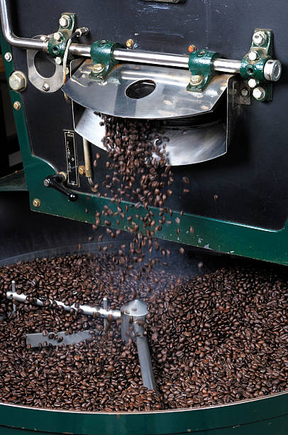 istock Freshly Roasted Coffee Beans Dropping from Hopper 183755055