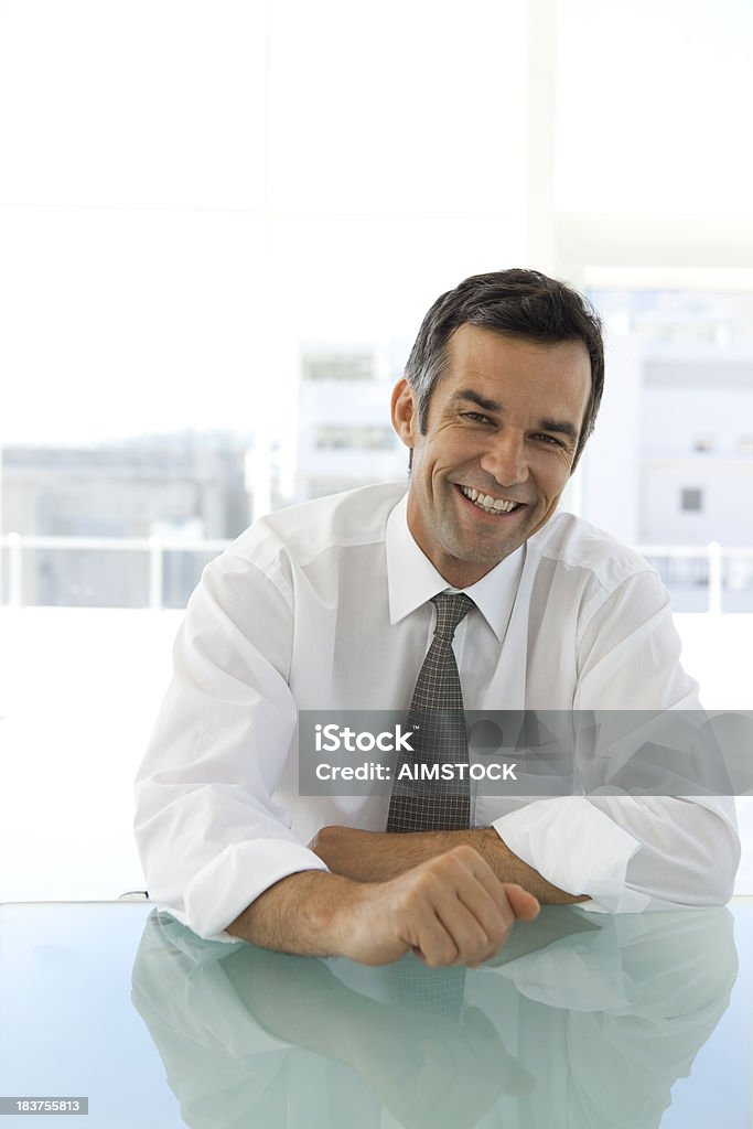 Businessman Portrait of a cheerful mature caucasian businessman Adult Stock Photo