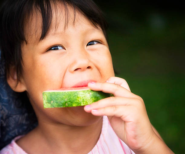 istock Cute Little Girl Looking at Camera 183756425