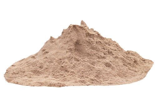 Pile of sand in construction site isolated on white background included clipping path.