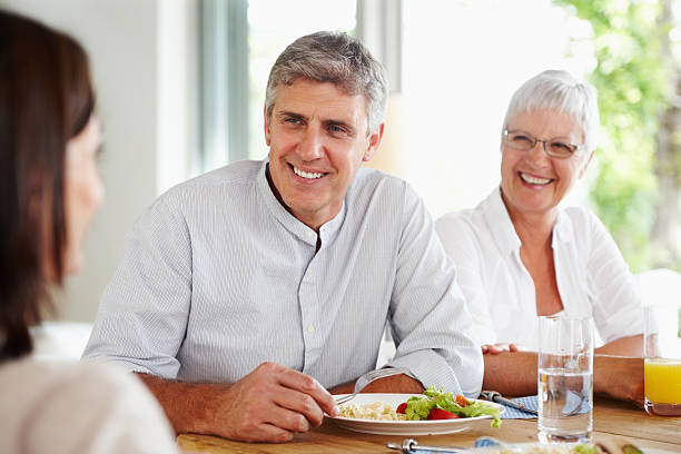 istock Happy family having lunch 183756878