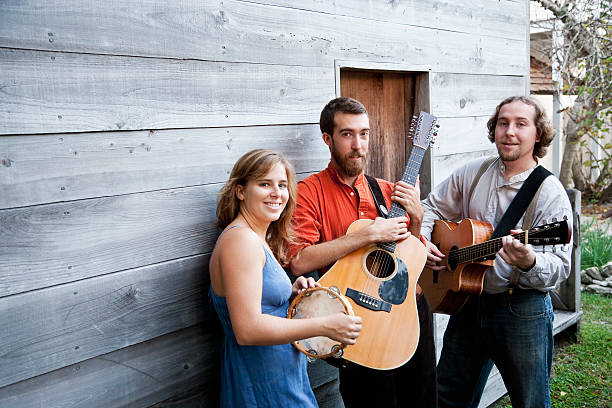 istock Musicians playing guitars and tambourine 183756945
