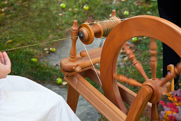Spinning wheel in motion stock photo