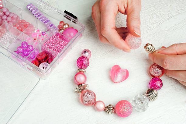 home made bead jewelry making as a hobby stock photo