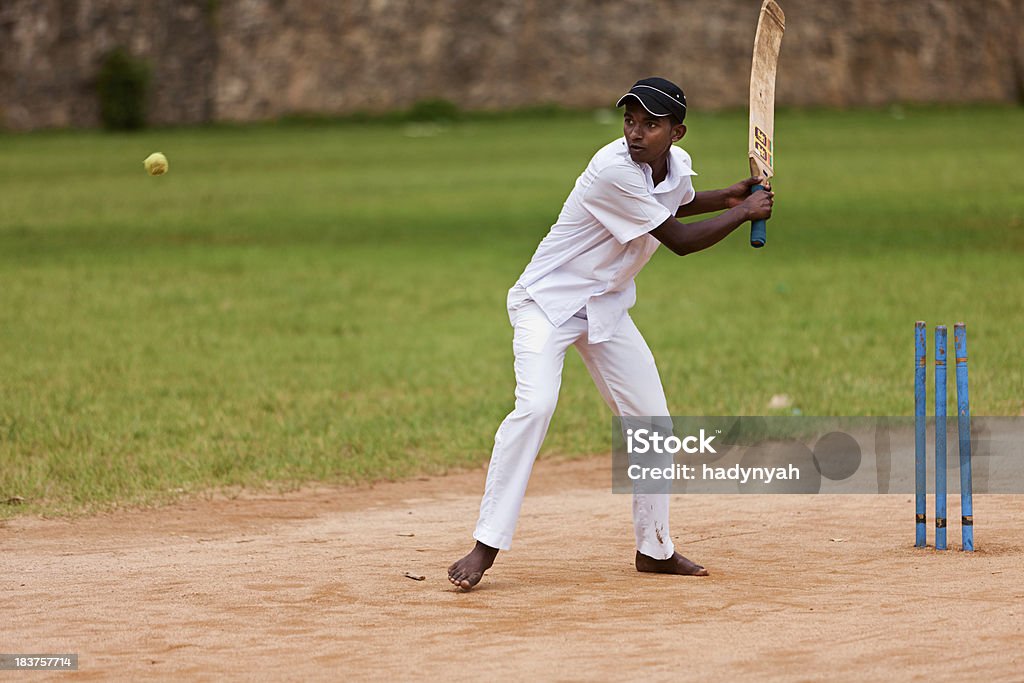 Young Sri Lankan schoolboys playing cricket Young Sri Lankan schoolboys playing cricket near Ella, Sri Lanka.http://bem.2be.pl/IS/rajasthan_380.jpg Culture of India Stock Photo