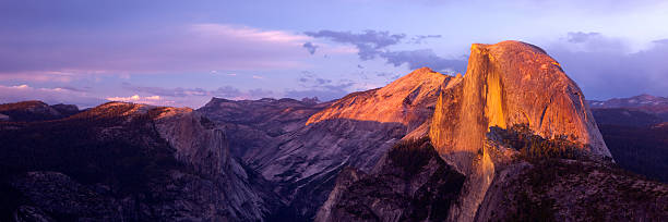 istock Panoramic view of Glacier Point over a purple sky at dusk 183757886